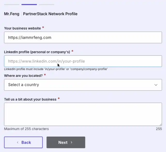PartnerStack network profile signup form showing required fields for business website URL, LinkedIn profile, country, and a brief business description